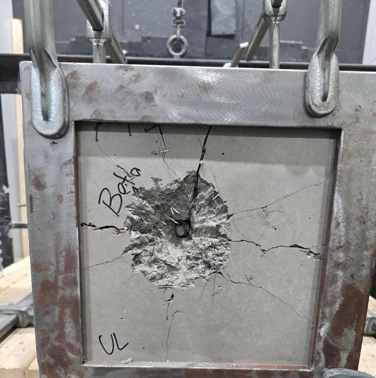 Delta Panel after a UL 752 Level 10 impact, bullet still in the face